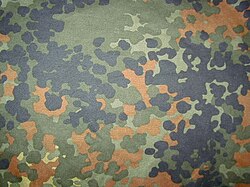 Modern German Flecktarn 1990 is a non-digital pattern designed to disrupt outlines at various distances.