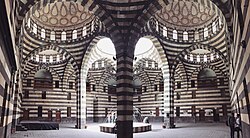 The Khan As'ad Pasha in Damascus (1753) is an example of the Ottoman penchant for domed units being integrated into local Syrian building styles.[305]