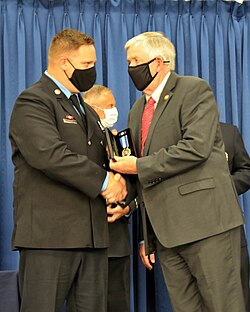 Parson wearing a face mask in October 2020