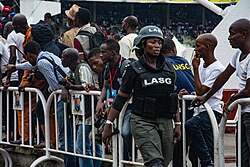 A Nigerian police officer at the Eyo festival in Lagos