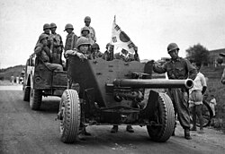 ROKA soldiers with a 57 mm anti-tank gun during the Korean War, 1950