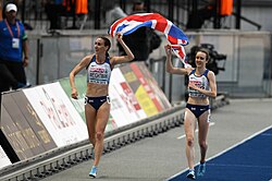 Laura Muir (R) and Laura Weightman (L) celebrate their 1500 m 1–3 at the 2018 European Athletics Championships in Berlin.