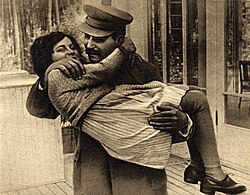 Stalin carrying his daughter Svetlana in 1935