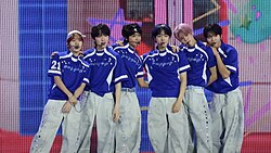 NCT Wish performing their single "Poppop" in April 2025