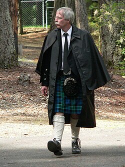 An Inverness cape worn with Highland dress, 2007 Tacoma Highland Games