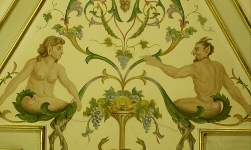 Painted fauns on library ceiling