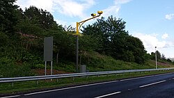 Average speed cameras, painted in yellow, operational from late 2024