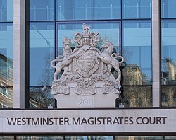 The coat of arms of the sovereign of the United Kingdom on the Westminster Magistrates' Court building in London, England
