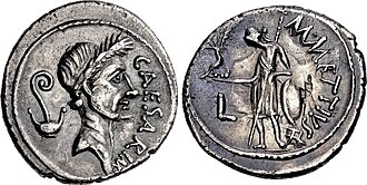 Denarius of Caesar, minted just before his murder, in 44 BC. It was the first Roman coin bearing the portrait of a living person.[306]