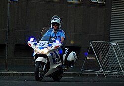 Cape Town Traffic Service officer on a motorbike in the V&A Waterfront
