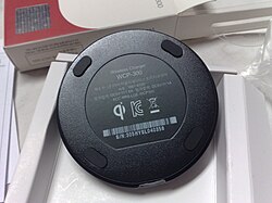 The bottom side of an LG WCP-300 Qi charging pad