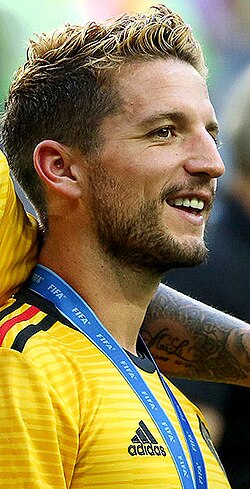 Mertens celebrating winning the 2018 FIFA World Cup bronze medal following Belgium's 2–0 win over England in the third place play-off