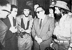 (Right to left) rebel leader Camilo Cienfuegos, Cuban President Manuel Urrutia Lleó, and Guevara (January 1959)