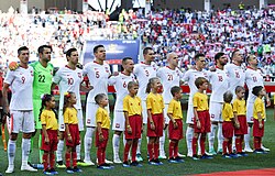The Poland national team line-up before the third and final group game against Japan on 28 June 2018. Poland won the game 1–0.[157]