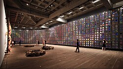 Held at the Museum of Old and New Art in Hobart, Tasmania, Sidney Nolan's Snake mural (1970) is inspired by the Aboriginal creation myth of the Rainbow Serpent, as well as desert flowers in bloom after a drought.[378]