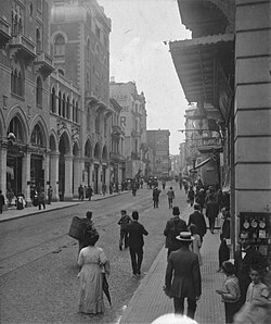 Cadde-i Kebir in 1912 (present-day İstiklal Avenue in Beyoğlu). The entrance of the Church of St. Anthony of Padua is seen at left. A Nestlé advertisement is visible on a building in the background.
