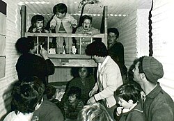 People in a bomb shelter at Kibbutz Dan