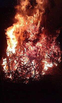 Zjarri for the celebration of Dita e Verës in Tropojë, northern Albania. Kindled on the eve or before sunrise in order to give strength to the Sun (Dielli), people dance and sing around it or jump across it, a ritual practiced for the end of winter, renewal, purification and apotropaic purposes.