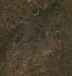 Lahore as seen from International Space Station. River Ravi flows from North to West. The city is rapidly growing towards the south.
