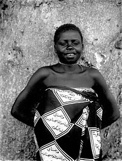 Swahili in Arabic script on the clothes of a girl in German East Africa (c. early 1900s)